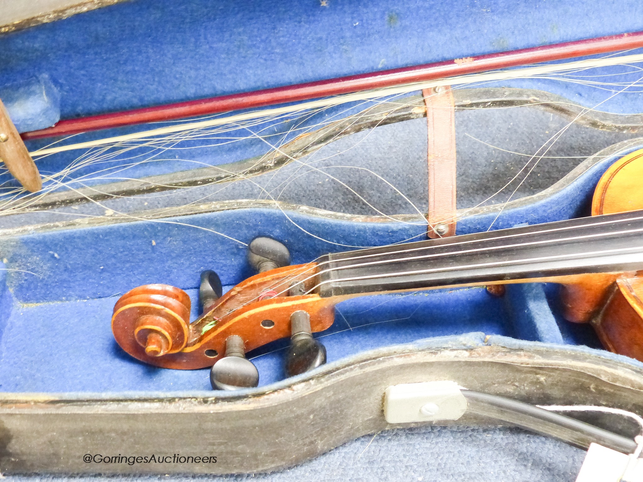 A student violin in case